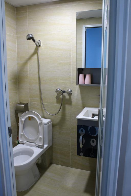 Apple Inn - Mongkok Гонконг Номер фото